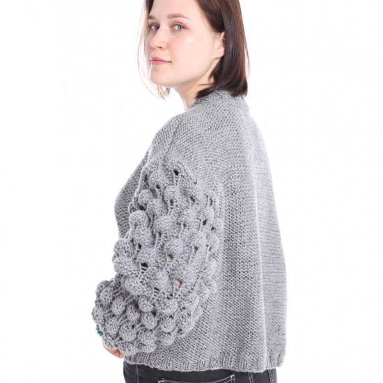 Knitted women's jacket with sleeves with balls "Silver Moon" code 120012 Knitted women's jacket with sleeves with balls "Silver Moon" code 120012